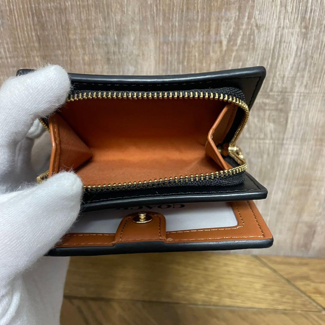 COACHコズミック スナップウォレットシグネチャー
