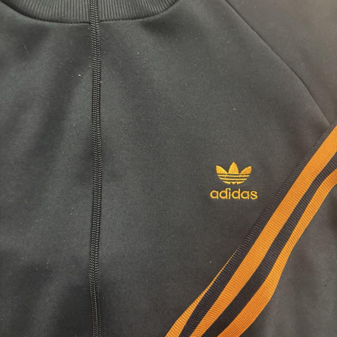 adidas トラックジャケット　ブラック/オレンジ