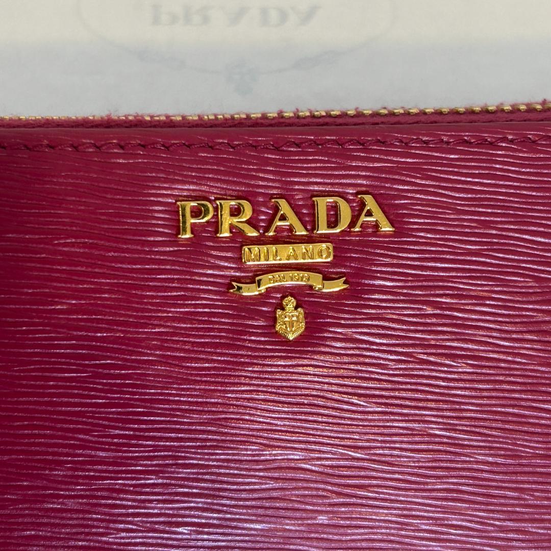 PRADA プラダ　サフィアーノレザー 長財布　ピンク　ラウンドファスナー