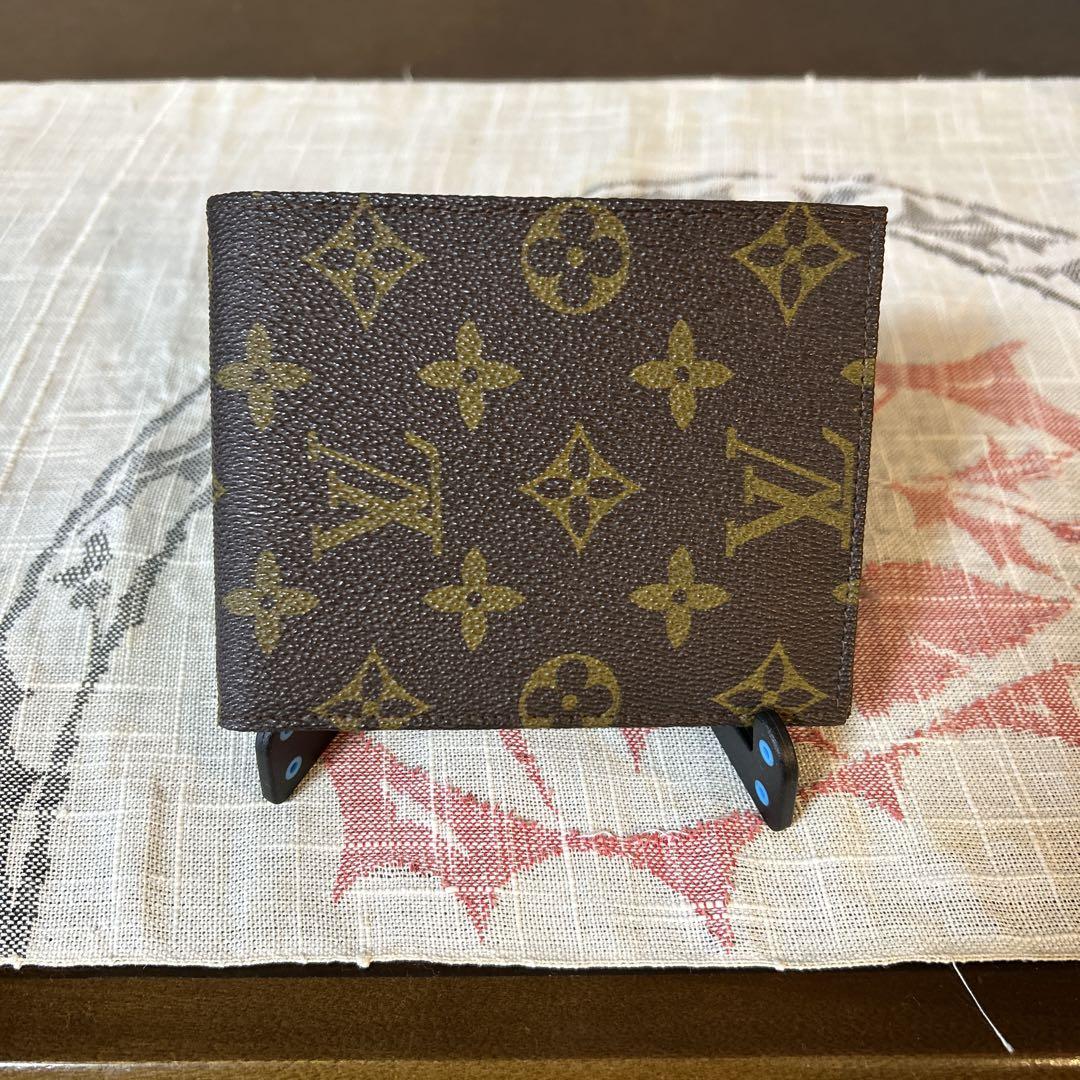 Louis Vuitton 二つ折り財布 ブラウン/イエロー - メルカリ