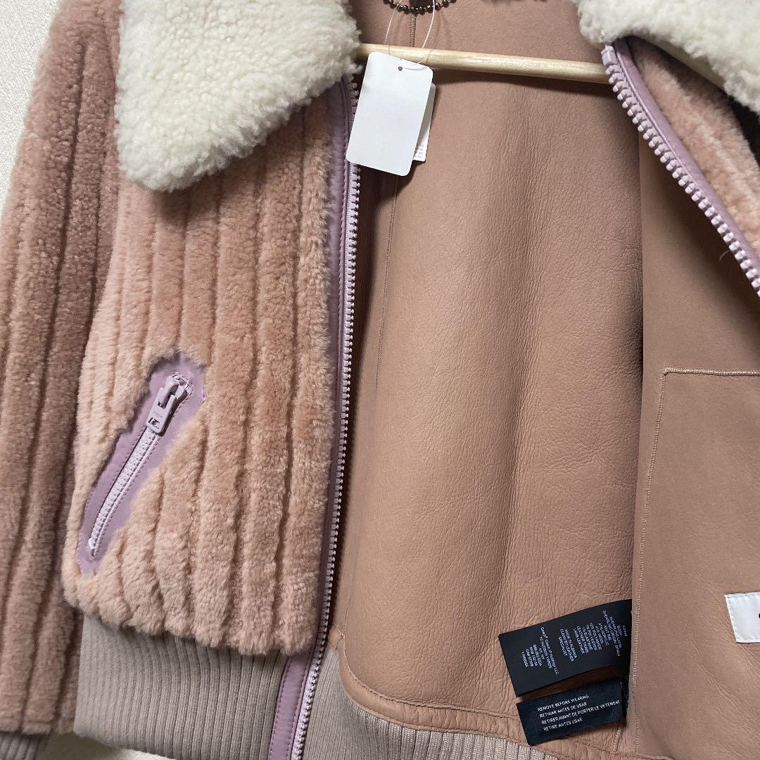 したらお◦ 新品未使用 ムートン ピンク 羊革 サイズ0 OKYRm-m64427285385 coach コーチ ブルゾン のサイズ