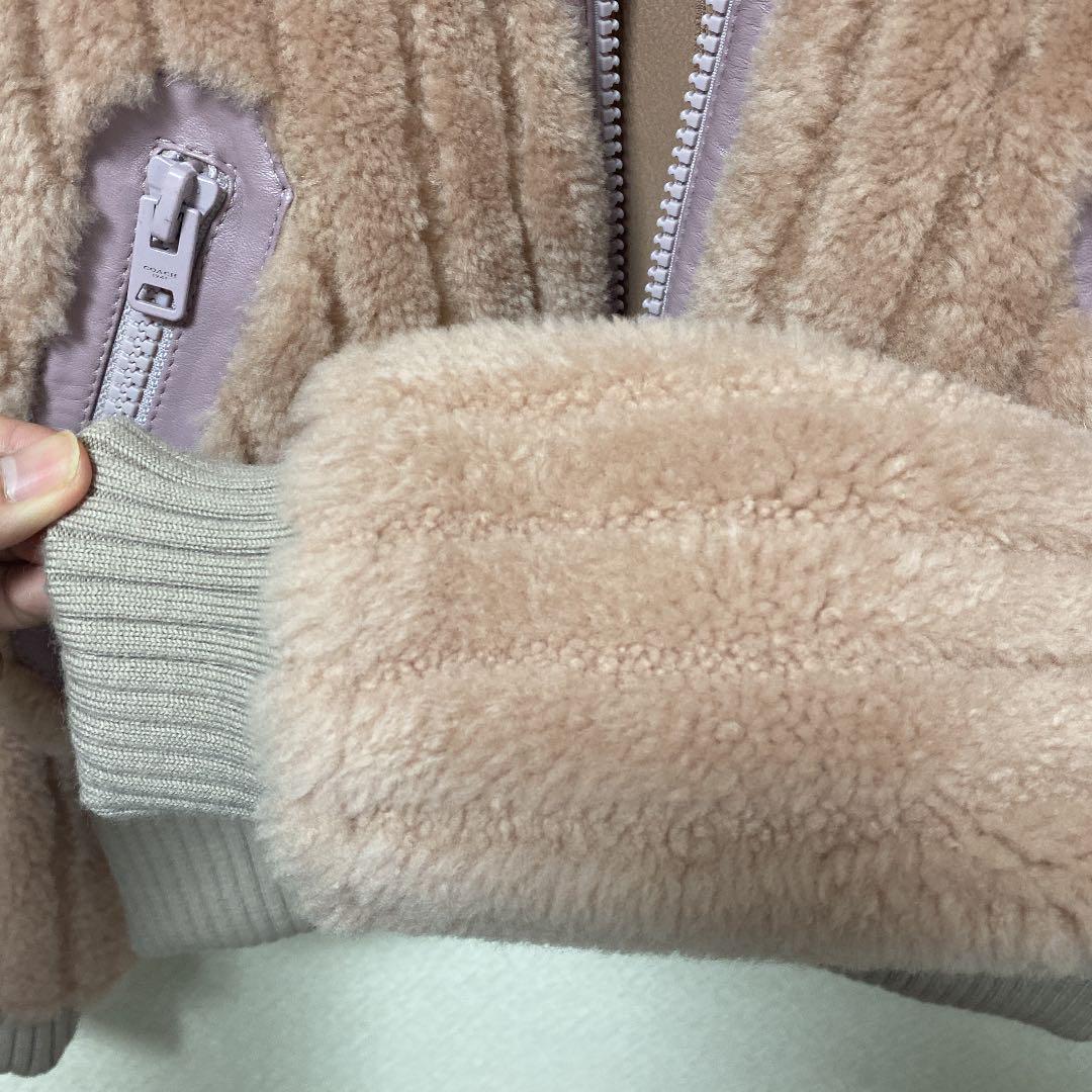 したらお◦ 新品未使用 ムートン ピンク 羊革 サイズ0 OKYRm-m64427285385 coach コーチ ブルゾン のサイズ