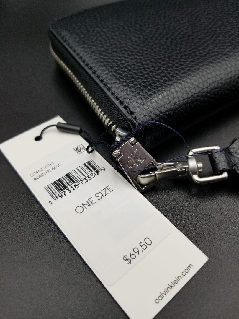 新品／Calvin Klein カルバン・クライン ストラップ ジップ長財布
