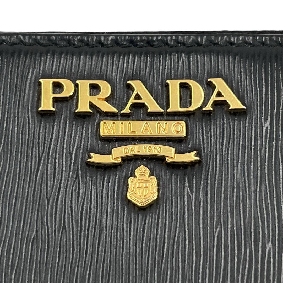 PRADA  プラダ　二つ折り財布　ゴールドロゴ　バイカラー　サフィアーノレザー