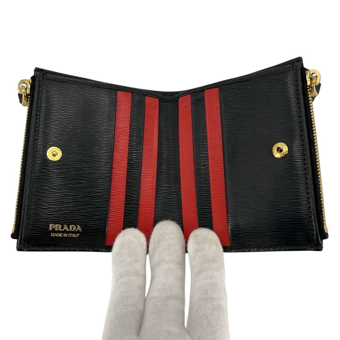 PRADA  プラダ　二つ折り財布　ゴールドロゴ　バイカラー　サフィアーノレザー