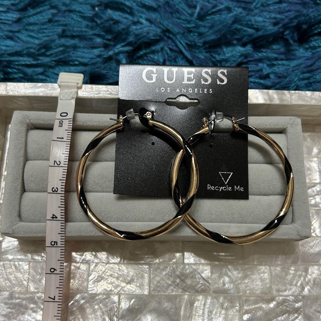 【GUESS】人気！ゲス ロゴ フープ ピアス /クリスタル GUESS】人気！ゲス ロゴ フープ ピアス /クリスタル