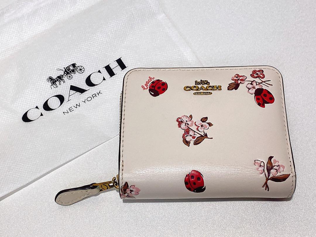 COACH 花とテントウムシ 二つ折り財布