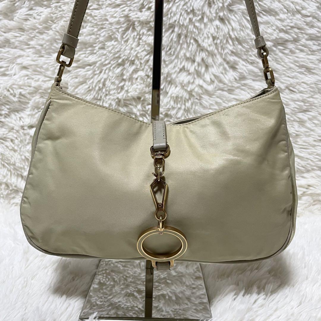 【美品】PRADA プラダ　アクセサリーポーチ　ベージュ　三角ロゴ　ゴールドロゴ