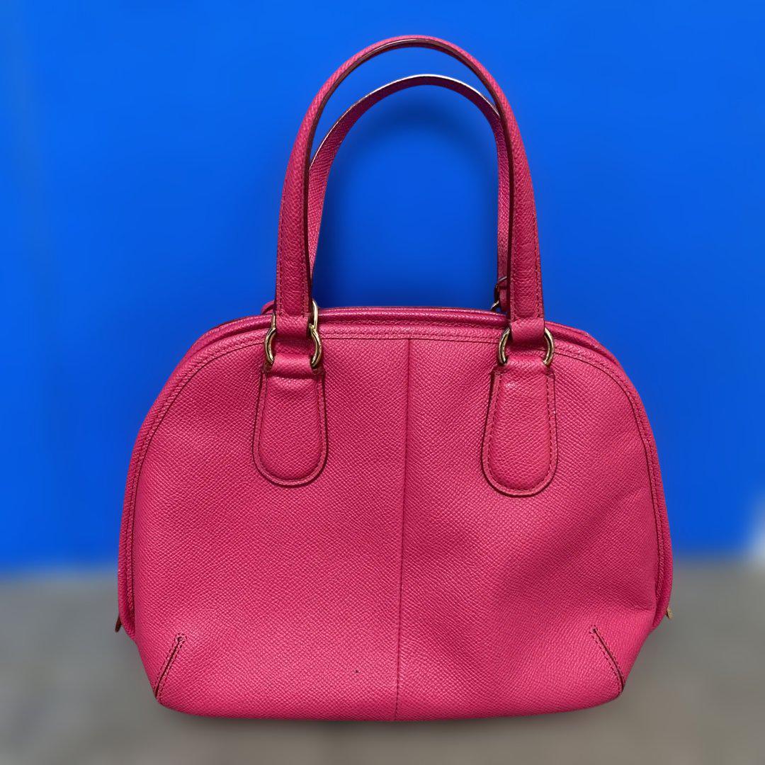 COACH ピンク レザー ハンドバッグ - メルカリ