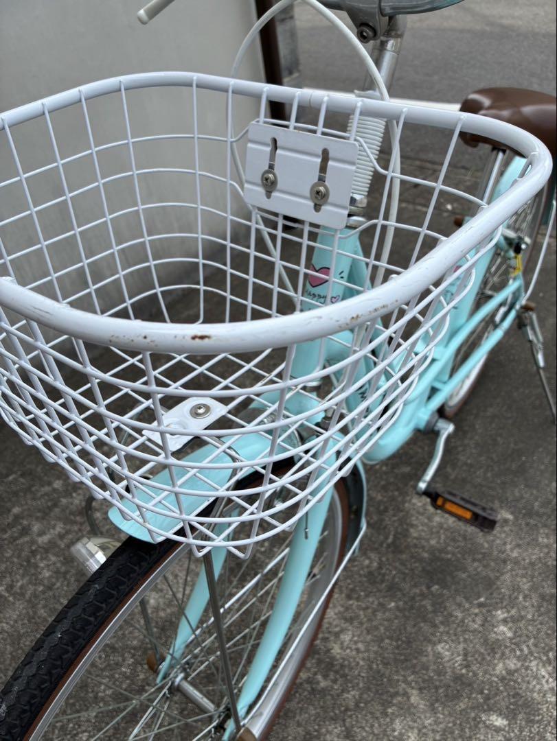 mi。引き取り。水色 24インチ シティサイクル 前カゴ付き