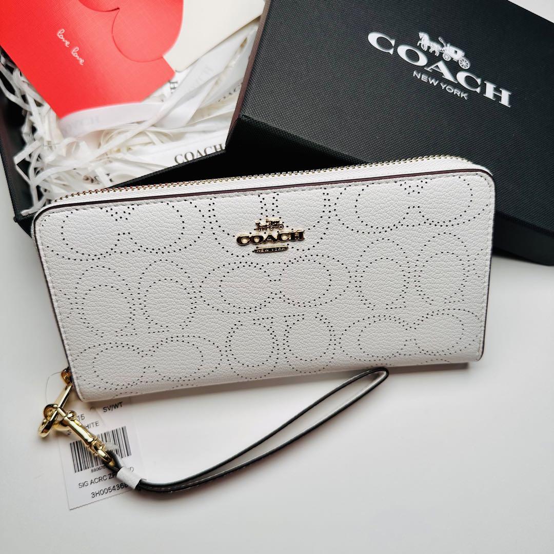 新商品Coach長財布　コーチ　シグネチャー柄パンチング　ホワイト
