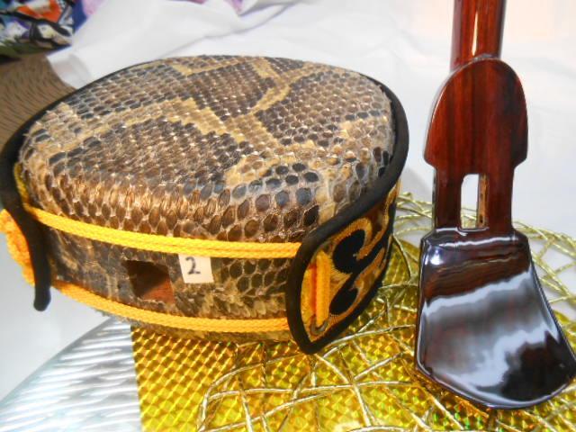 現品販売(送料無料)44.980円　沖縄三線専用　紫檀棹と胴巻付き蛇皮強化チーガ