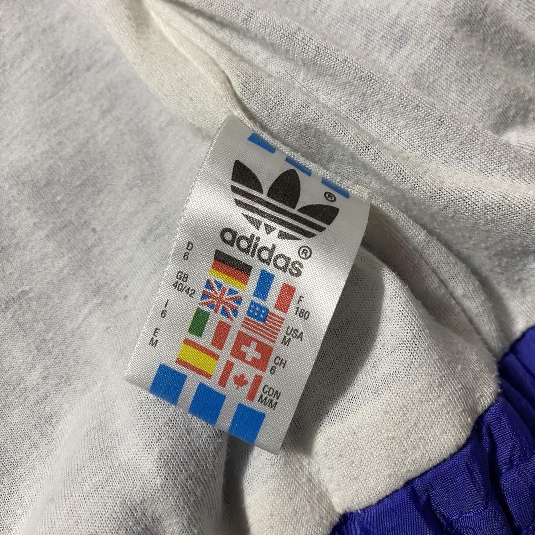 adidas 刺繍ロゴクレイジーパターンナイロンジャケット