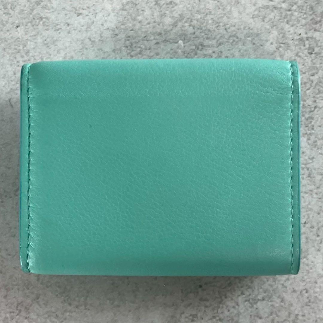 【美品 付属品完備】ティファニー 三つ折り 財布 ボタン ロゴ 金具 レザー 美品 付属品完備】ティファニー 三つ折り 財布 ボタン ロゴ 金具