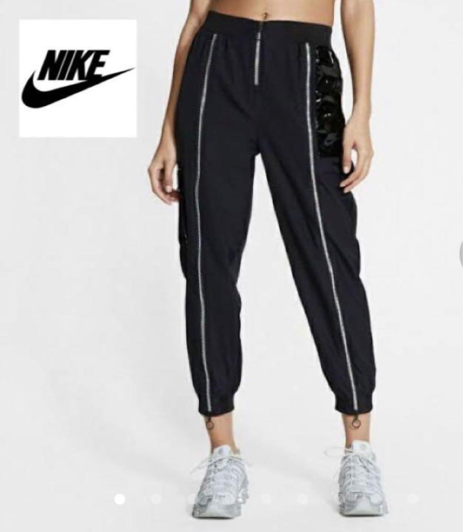 でお得に通販】 NIKE ルーズフィットエナメル 切り替えジップロング