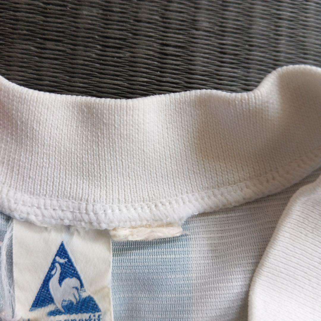 le coq sportif 水色と白のストライプシャツМサイズマラドーナモデル