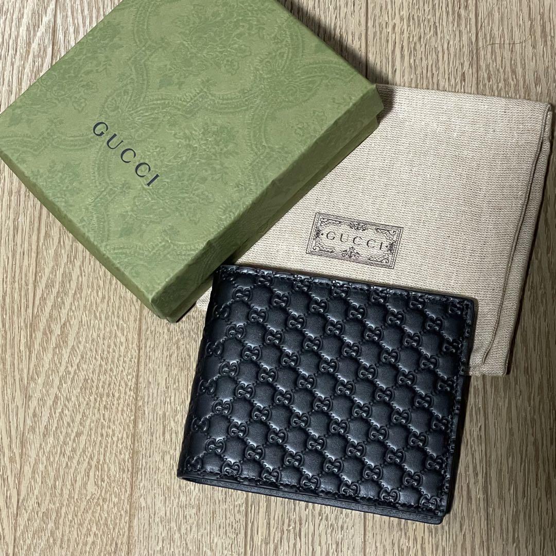 GUCCI メンズ　お札専用　二つ折り財布　GGエンボス柄　ブラック
