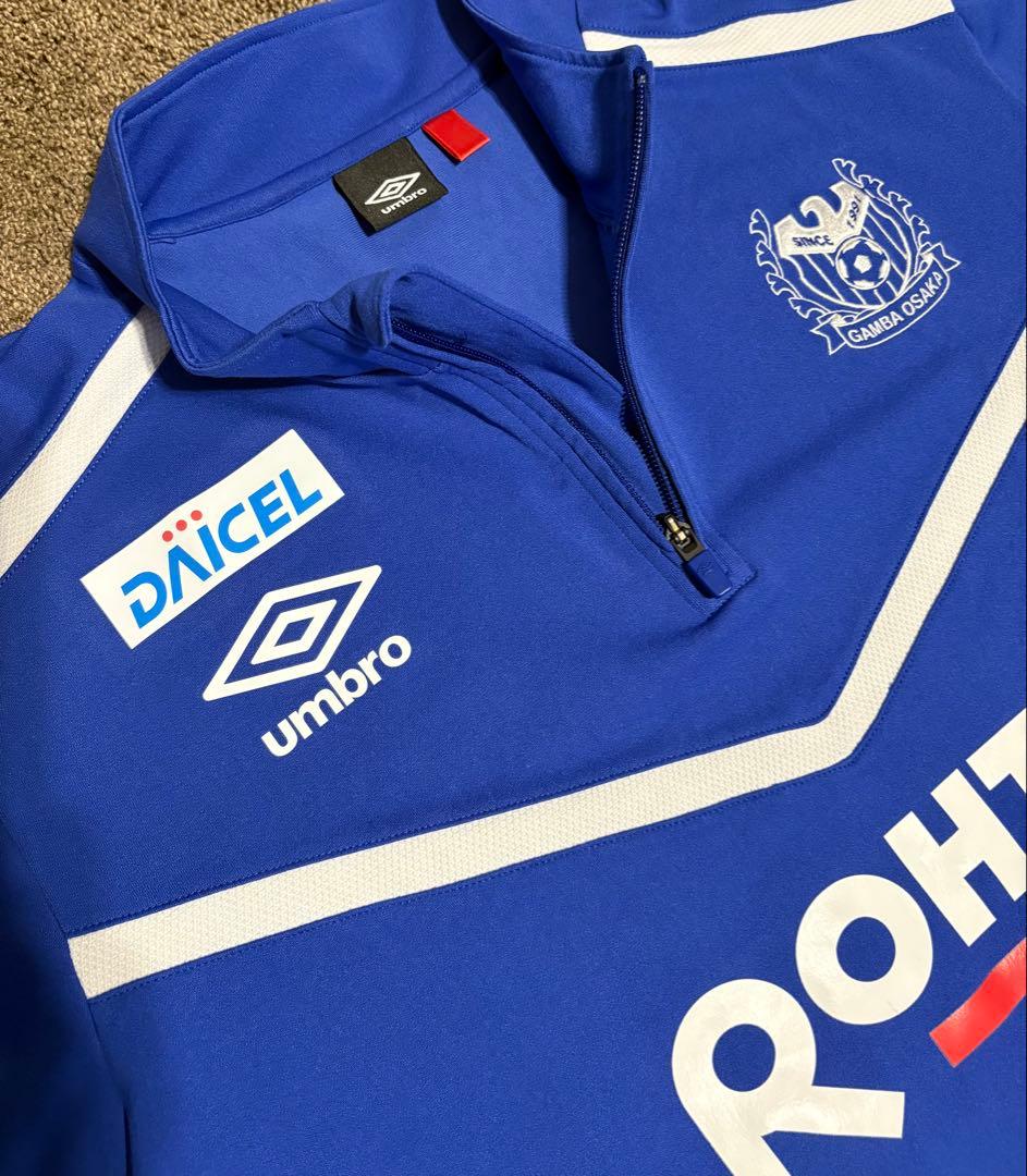 ガンバ大阪支給品【umbroハーフジップ上下】O〜XOフルスポンサー赤タグ ガンバ大阪支給品【umbroハーフジップ上下】O〜XOフルスポンサー赤タグ