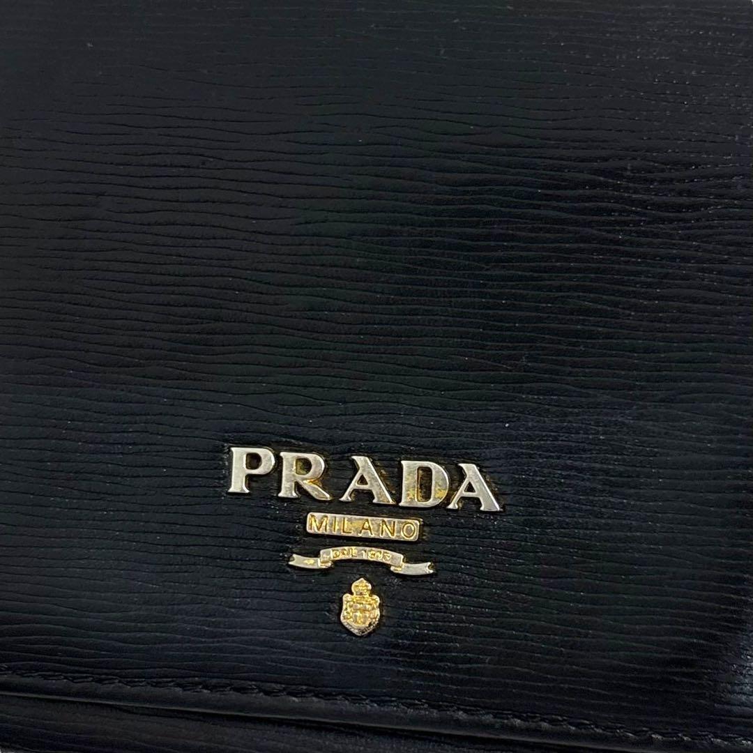 美品✨ PRADA プラダ 三つ折り財布 エピ革 レザーブラック 黒 美品✨ PRADA プラダ 三つ折り財布 エピ革 レザーブラック 黒