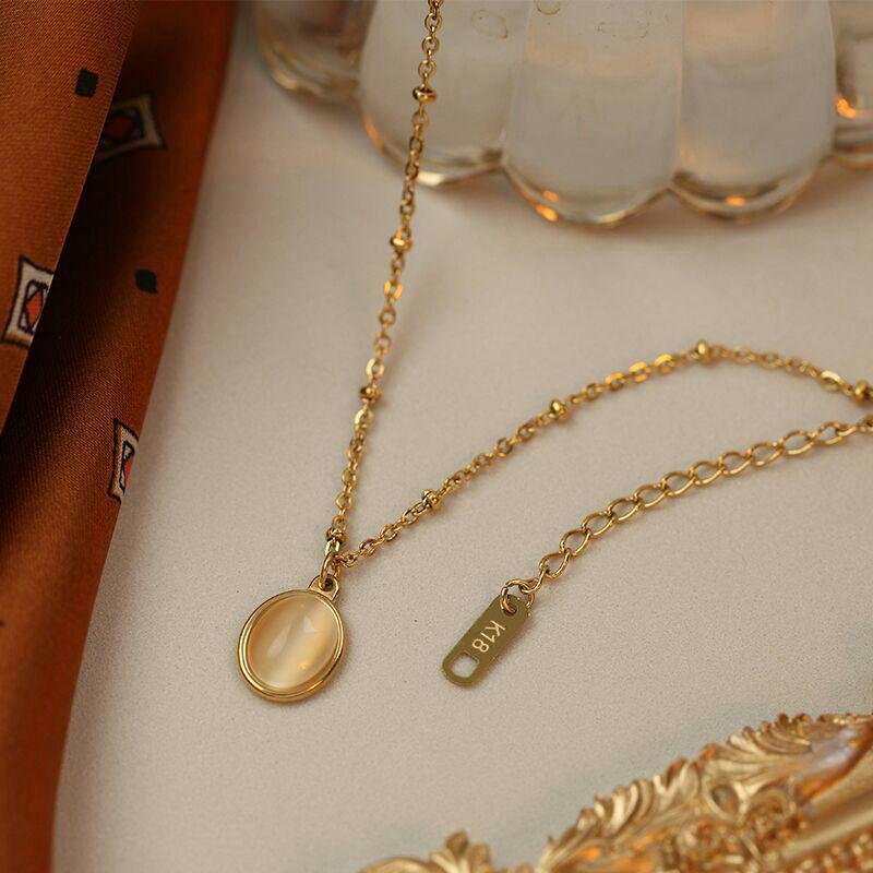 18金キャッツアイペンダント 希少品】キャッツアイのペンダントネックレス18 K金鎖骨チェーンdo