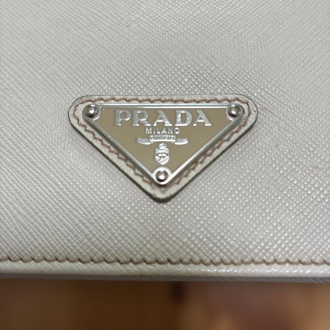 バーゲンで ホワイト PRADA ビジネスバッグ メルカリ - バッグ