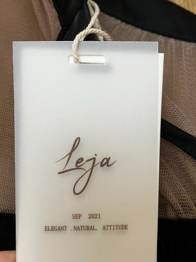 Leja（レジャ）の「【LEJA】バックリボン美脚効果シアー切り替え