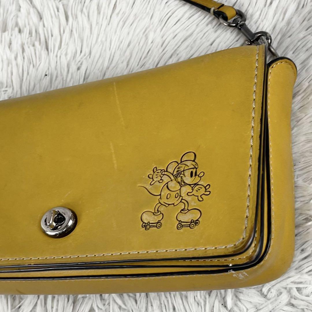 美品 コーチ レザー ショルダー ディンキー ディズニー ターンロック イエロー 美品 コーチ レザー ショルダー ディンキー ディズニー ターン