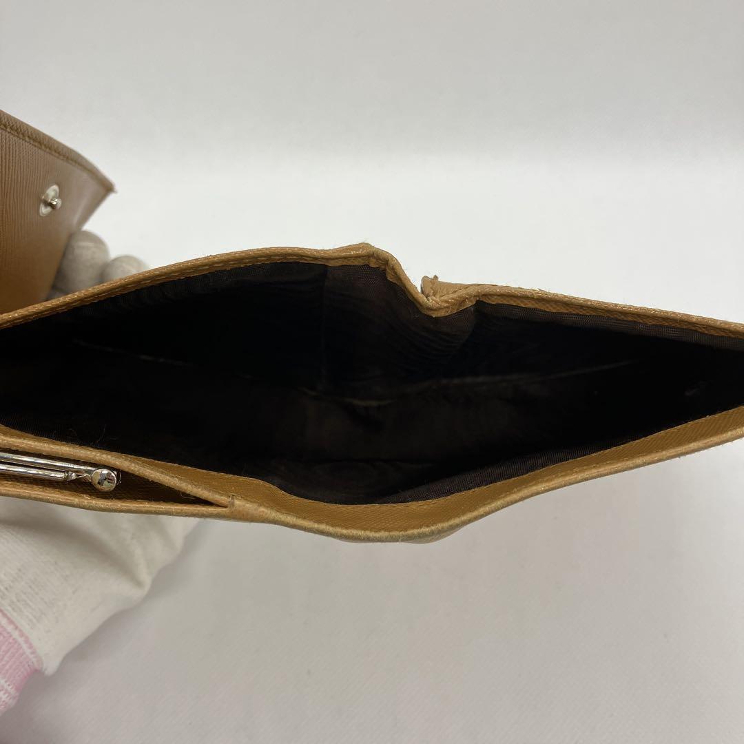 PRADA プラダ 三つ折り財布 がま口 三角ロゴ 2742 - メルカリ