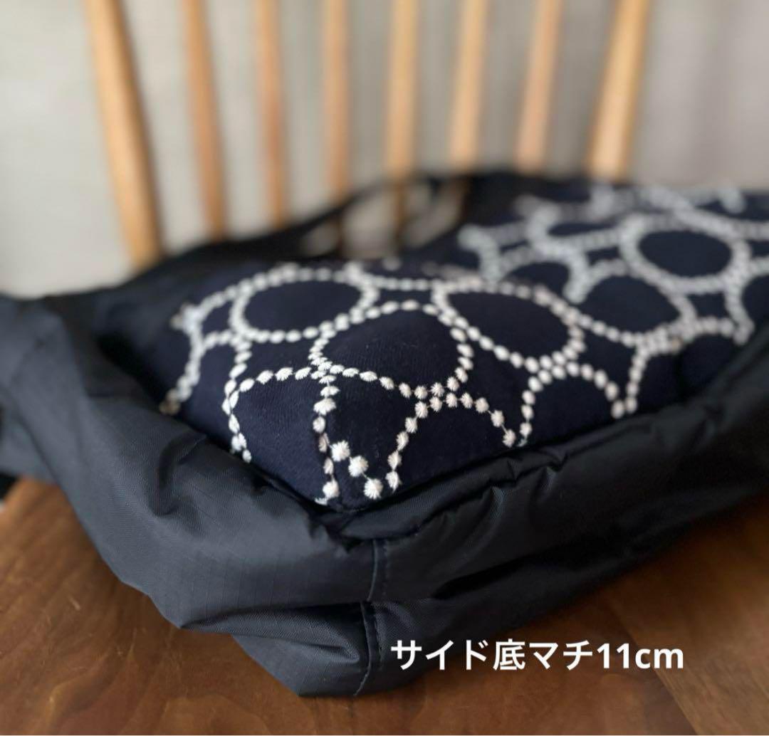 大きなポケットのさショルダーバッグ ミナペルホネン mina