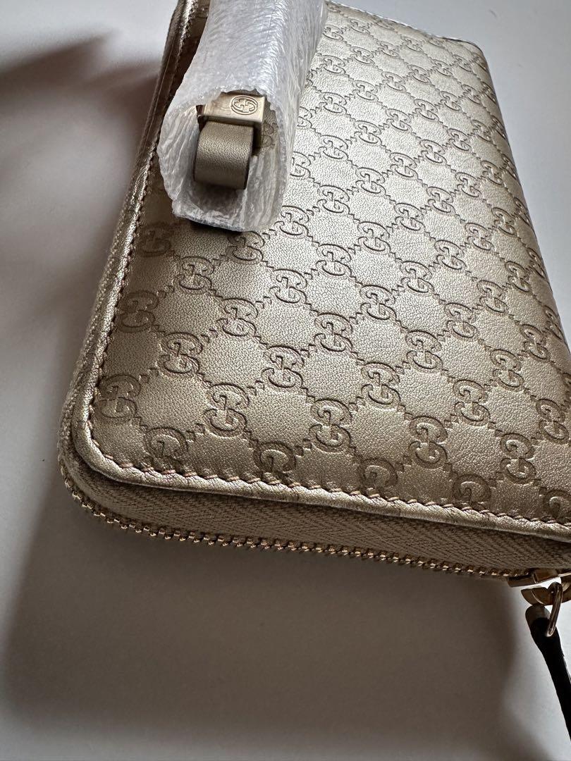 新品未使用】GUCCI ゴールド 二つ折り財布