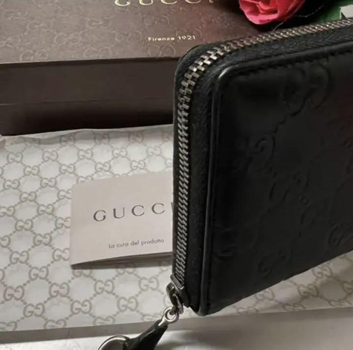 【未使用品】GUCCI(グッチ)二つ折り長財布 AU033