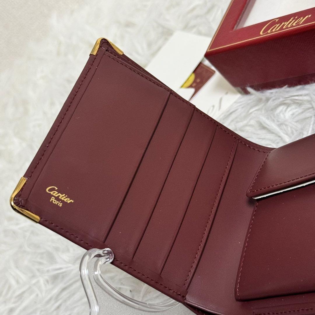 カルティエ　マストライン　二つ折り財布　ロゴ型押し　ボルドー 新品未使用⭐️カルティエ 二つ折り財布 型押しロゴ マスト