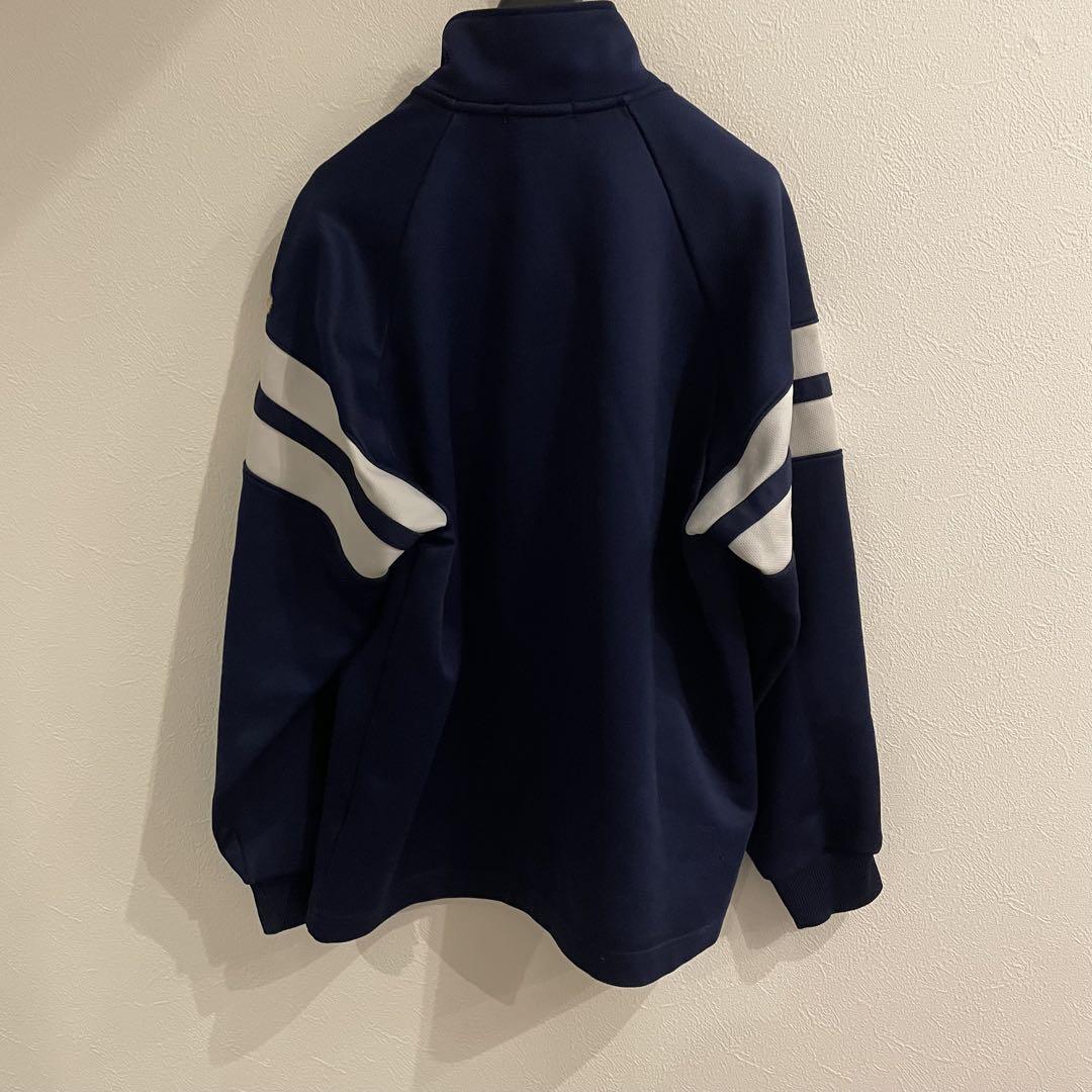 FILA ネイビージップアップジャケット - メルカリ