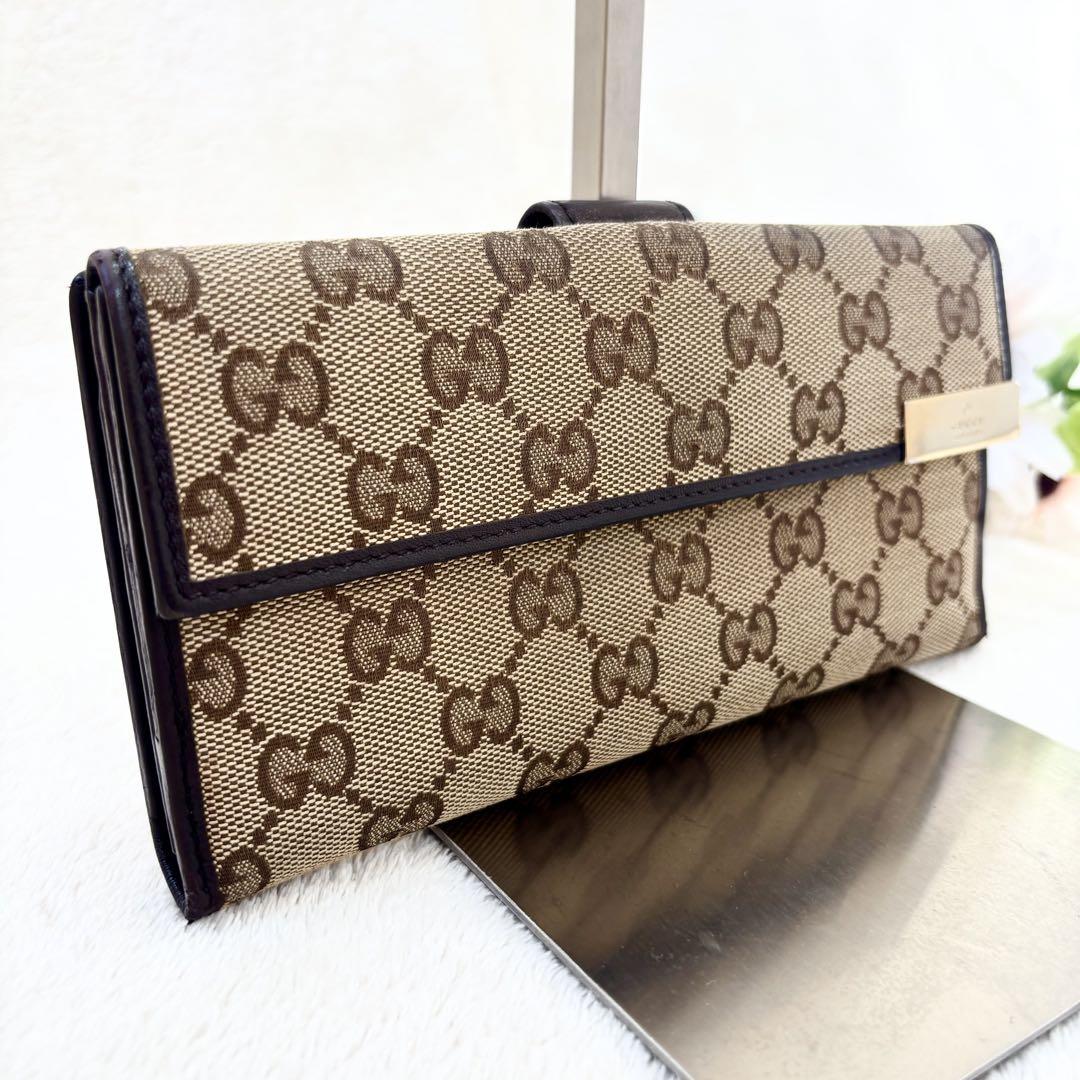 グッチ 長財布 フラップ式 GG キャンバス ゴールドプレート グッチ 長財布 ゴールドプレート フラップ式 GG キャンバス