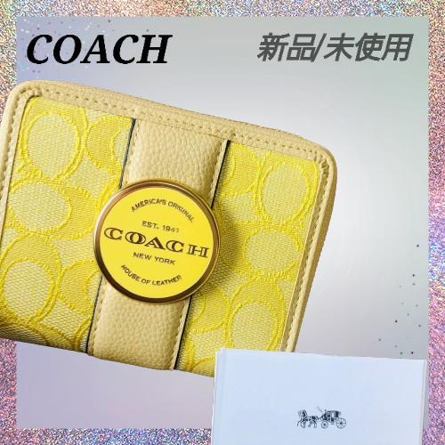 COACH コンパクトファスナー財布　イエロー