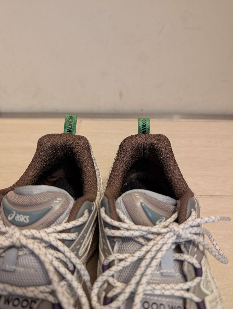 × Asics