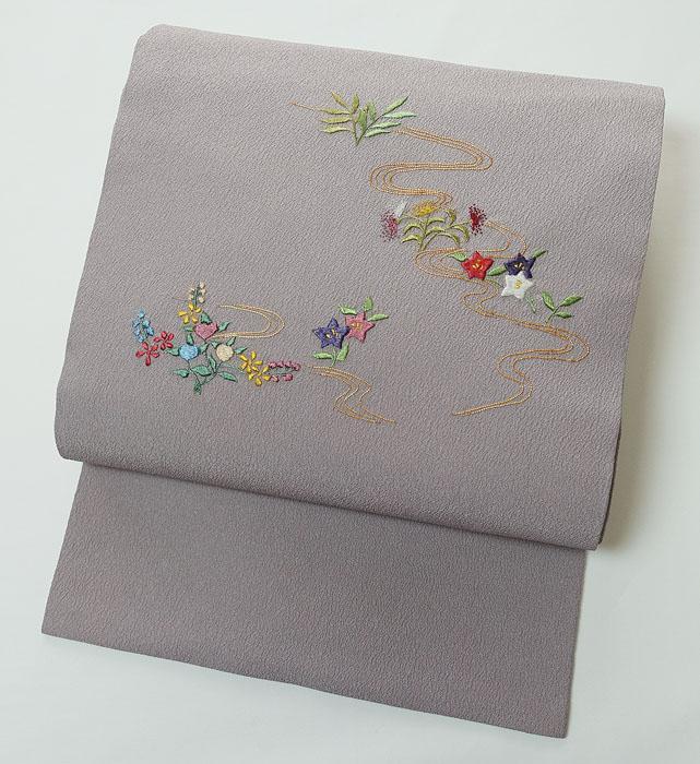 未使用 九寸名古屋帯 ちりめん地 お太鼓柄 花柄刺繍 正絹 11441