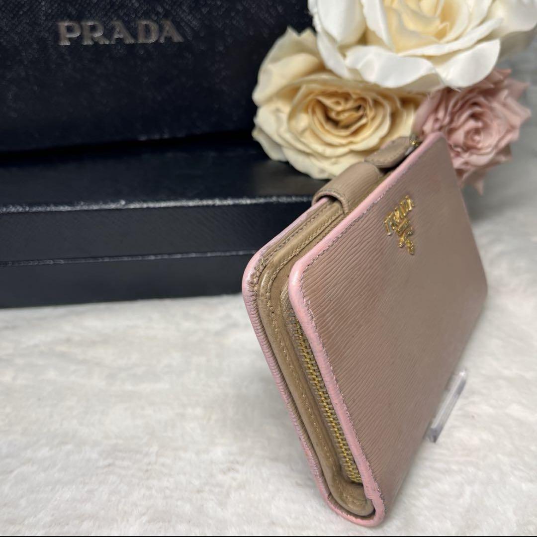 PRADA 二つ折り財布 ベージュ ピンク - メルカリ