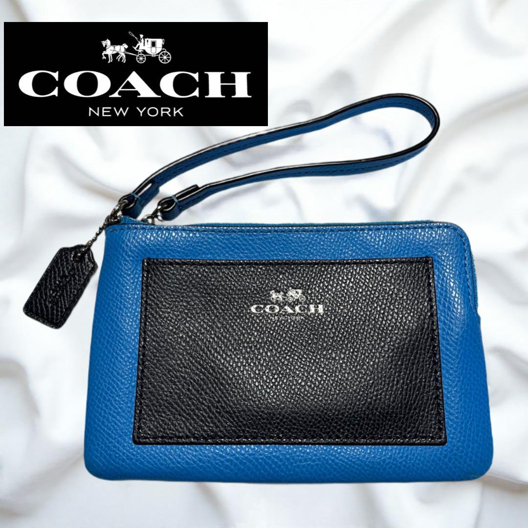 【更に値下げ】coach ポーチ　青　マルチポーチ　リストレット 更に値下げ】coach ポーチ 青 マルチポーチ リストレット - メルカリ