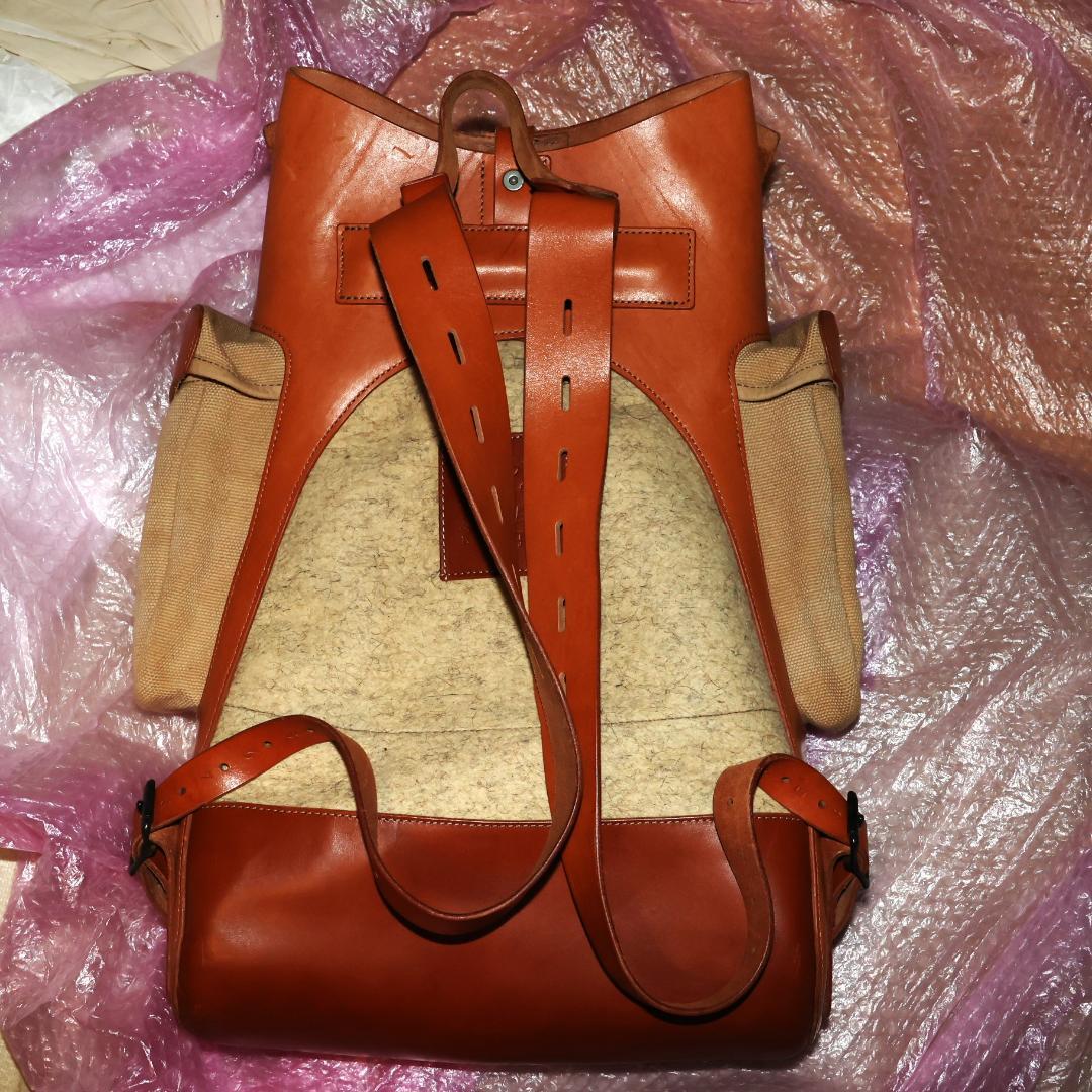 バッグ notlessorequalfelt and leather backpack