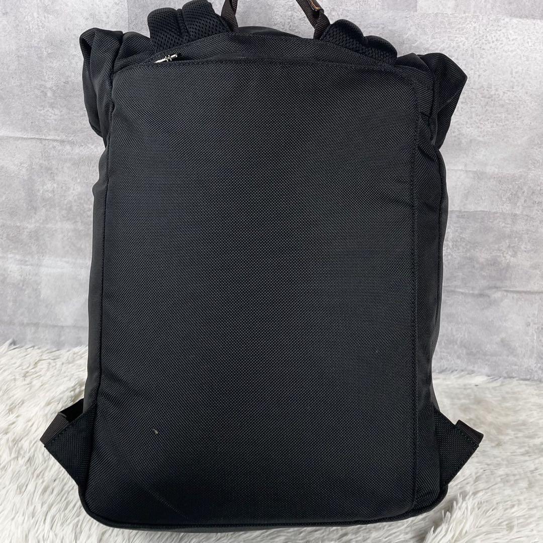 【１着でも送料無料】 美品 ロゴ型 フラップ ロールアップ リュック キャンバス TUMI バッグ