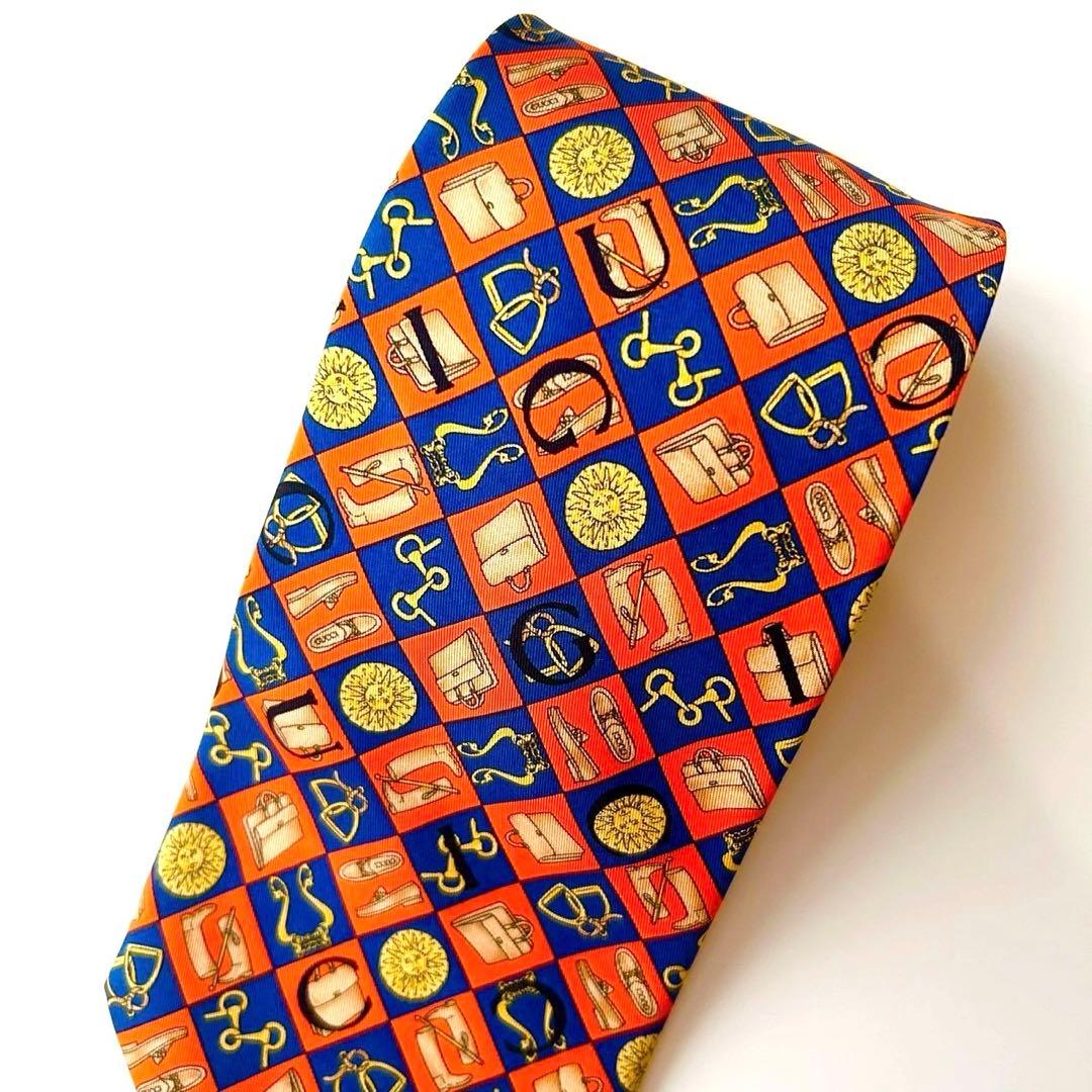 【未使用】グッチ シルクネクタイ 乗馬アイコン総柄 橙×紺 伊製 大剣9.5cm
