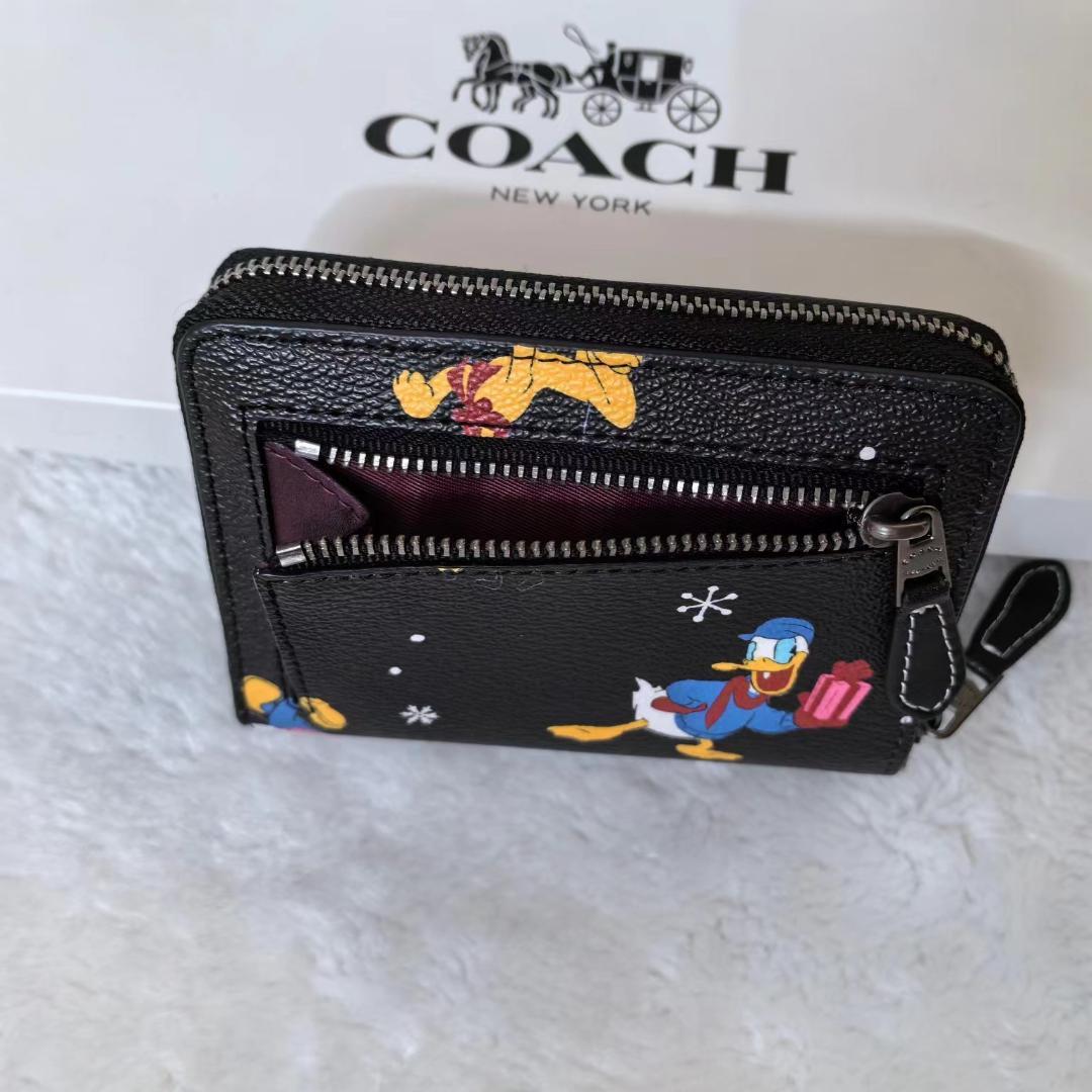 COACH ミッキー ドナルド 二つ折り財布 COACH ミッキー ドナルド 二つ折り財布 - メルカリ