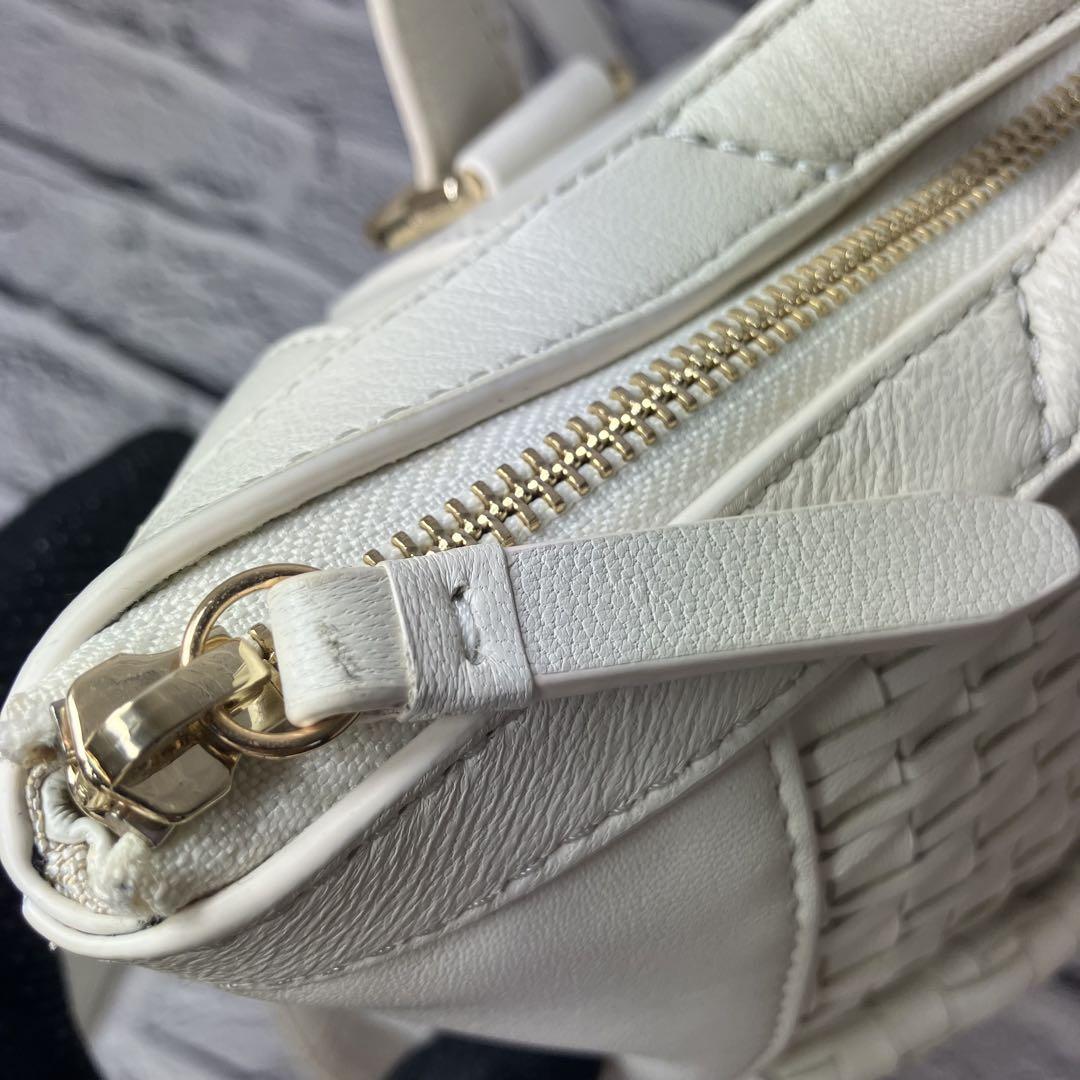現行ロゴ✨Cole Haan Genevieve Weaveリュック - メルカリ