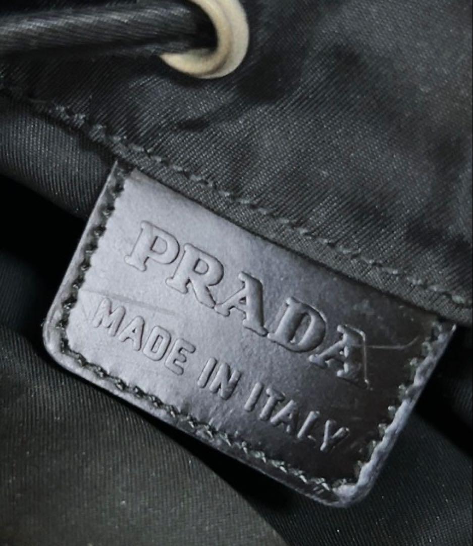 プラダ PRADA 巾着袋 三角ロゴ ブラック - メルカリ