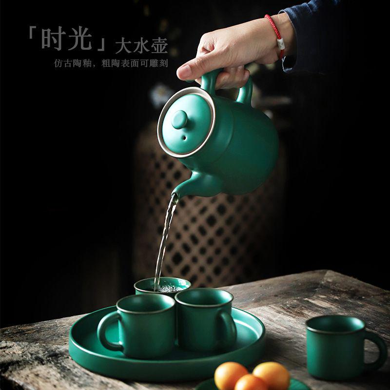 谷影復古のティーポットの陶磁器の粗陶のやかんの花のお茶は
