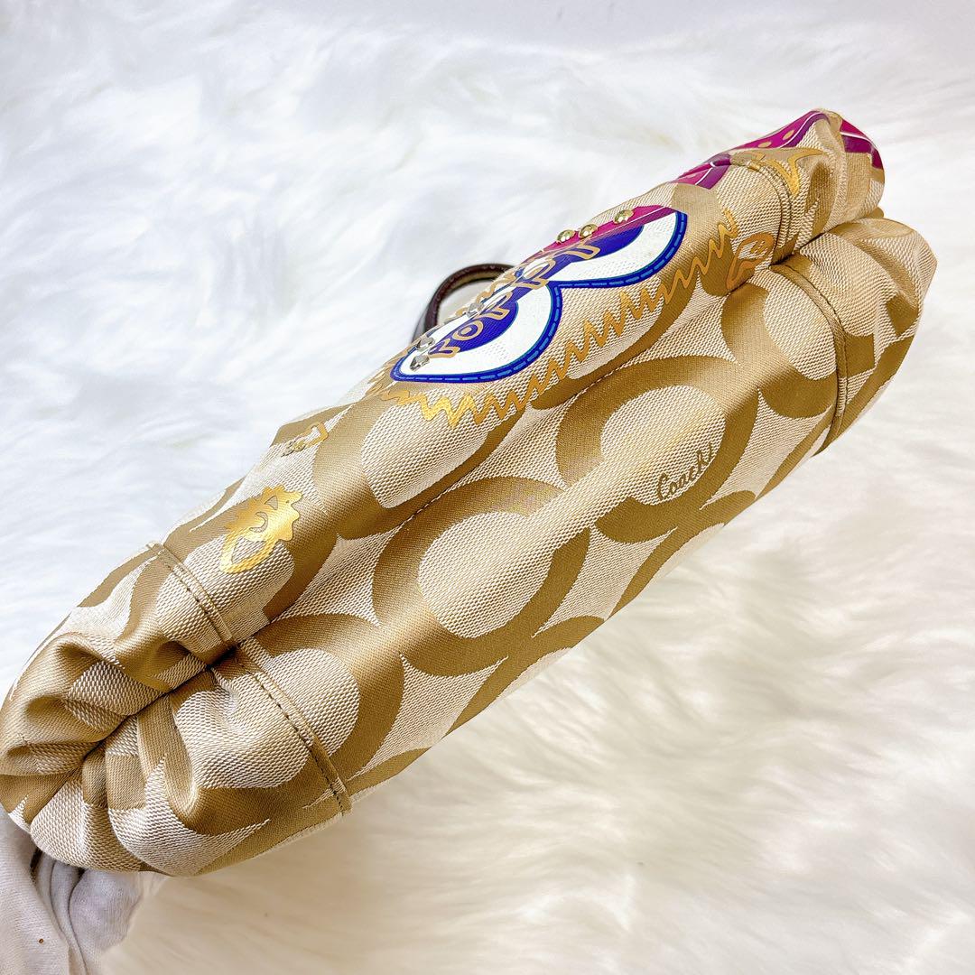 美品✨コーチ　ポピー　スパンコール　シグネチャー　ハート柄　スタッズ 2way