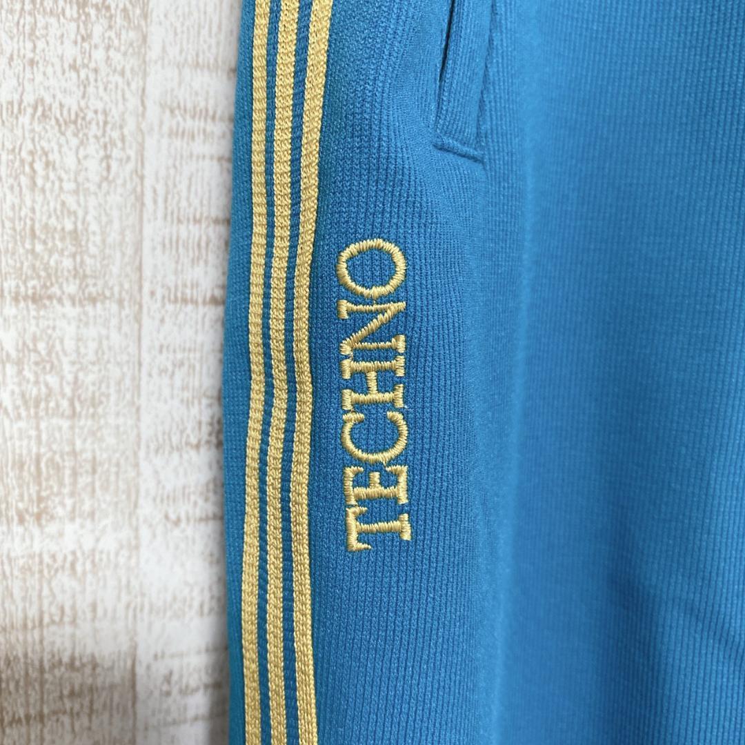 優れた品質 adidas】足掛け付きトラックパンツ L ターコイズブルー ゴールド ウォーキング・ランニングウェア