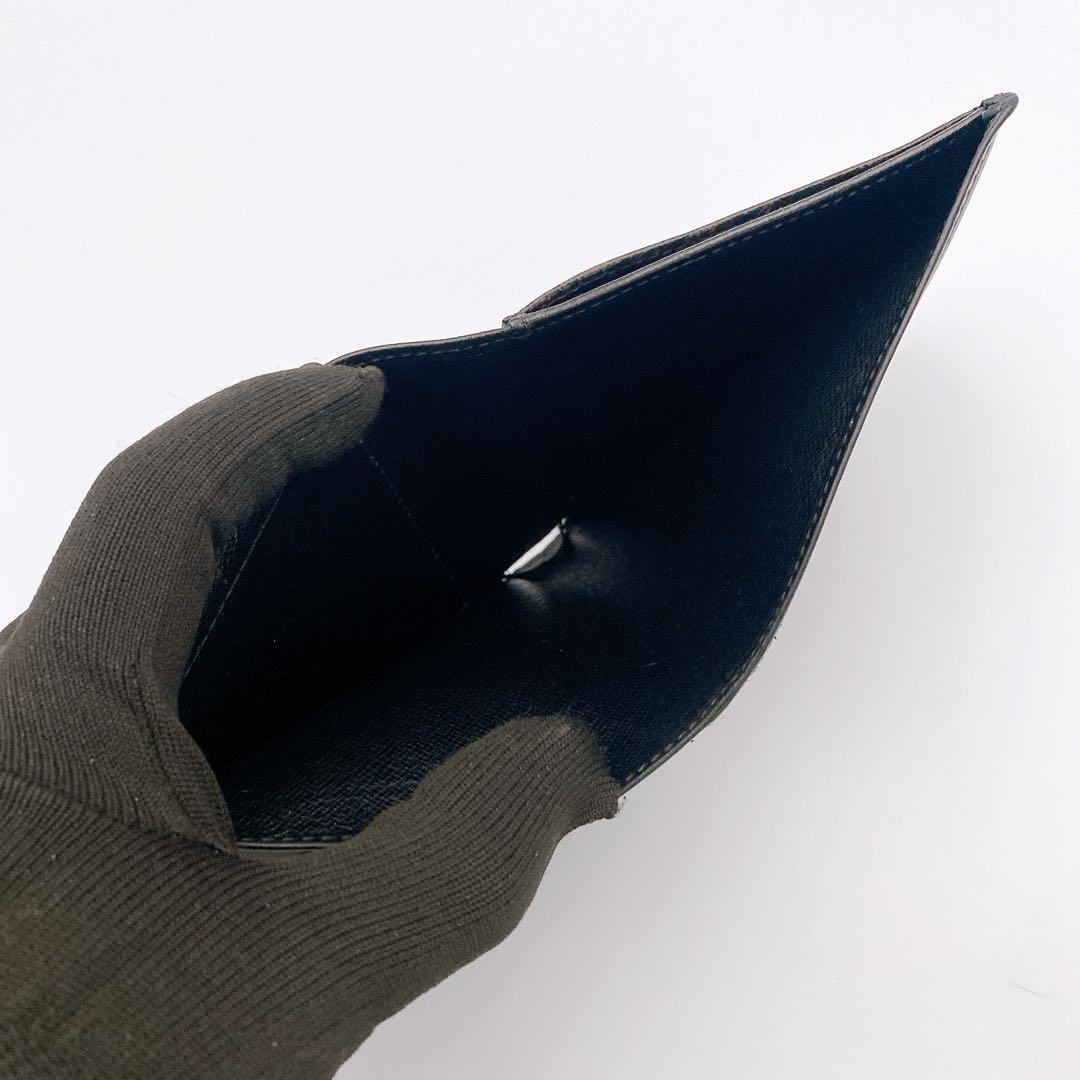 二つ折り財布 M63552