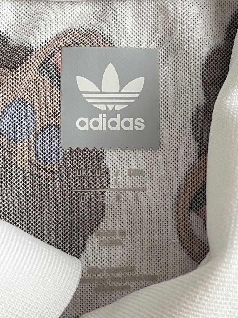 adidas ポロシャツ アディダスオリジナルス アフロ総柄